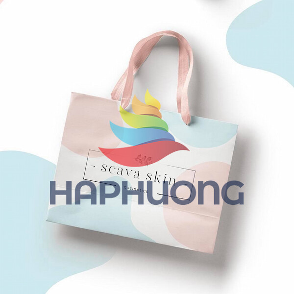 Mẫu túi giấy đựng mỹ phẩm với thiết kế màu tinh tế kèm logo thương hiệu